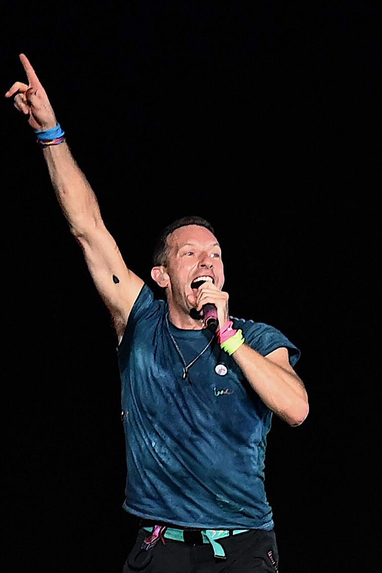 Chris Martin, líder de Coldplay, nació en 1977, Año de la Serpiente. (SUJIT JAISWAL / AFP)