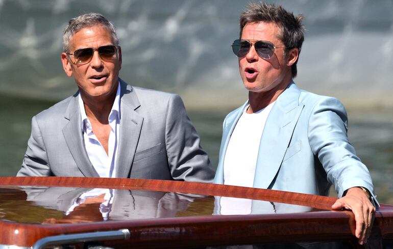 George Clooney y Brad Pitt, este domingo en Venecia.
