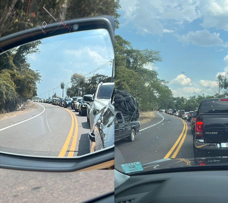 Filas de vehículos que esperan avanzar en medio de un intenso calor durante la tarde de este viernes.