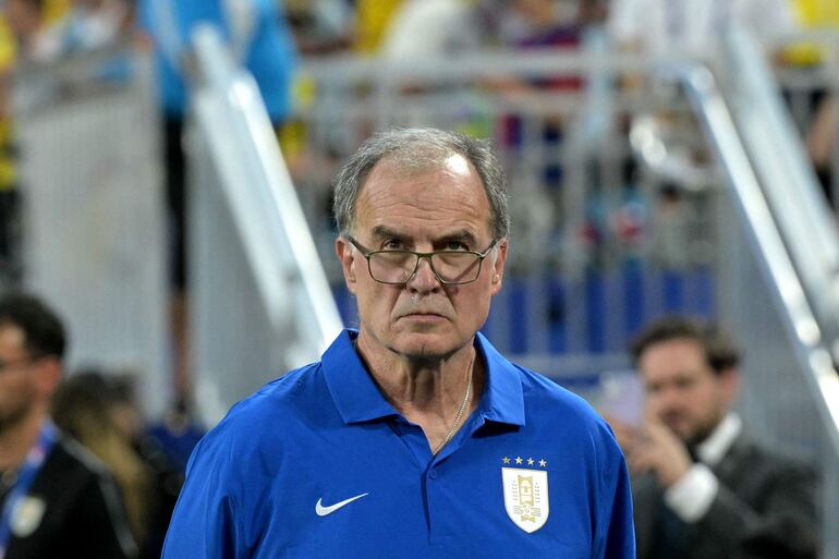 Uruguay's Argentine coach Marcelo Bielsa looks on ahead of the Conmebol 2024 Copa America tournament semi-final football match between Uruguay and Colombia at Bank of America Stadium, in Charlotte, North Caroline on July 10, 2024. (Photo by JUAN MABROMATA / AFP)