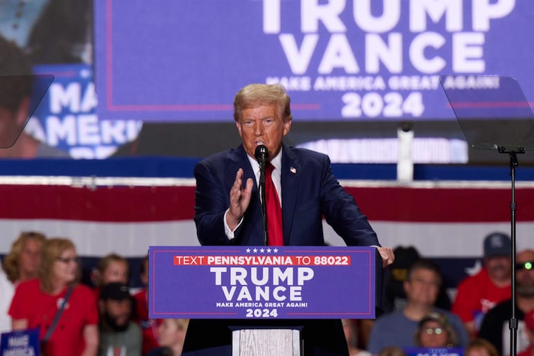 TOPSHOT - Former US President and Republican presidential candidate Donald Trump speaks during a campaign event at the Bayfront Convention Center in Erie, Pennsylvania, September 29, 2024. (Photo by DUSTIN FRANZ / AFP)