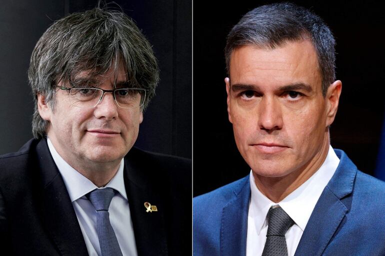 Expresidente del Gobierno regional de Catalunya, Carles Puigdemont (i) 
 y  el jefe de Gobierno en funciones de España, Pedro Sánchez. (AFP)