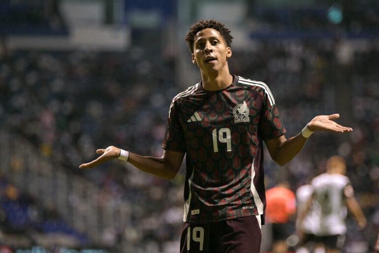 Mexico's midfielder #19 Ozziel Herrera celebrates scoring his team's second goal during the international friendly football match between Mexico's national football team and Spain's Valencia CF at the Cuauhtemoc Stadium in Puebla, Mexico, on October 12, 2024. (Photo by YURI CORTEZ / AFP)