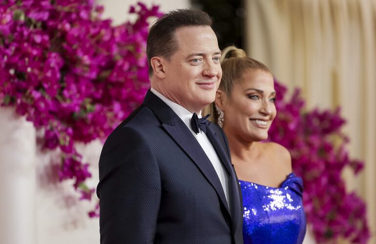 Brendan Fraser y Jeanne Moore, otra linda pareja que anoche pasó por la red carpet del Dolby Theatre. (EFE/EPA/ALLISON DINNER)
