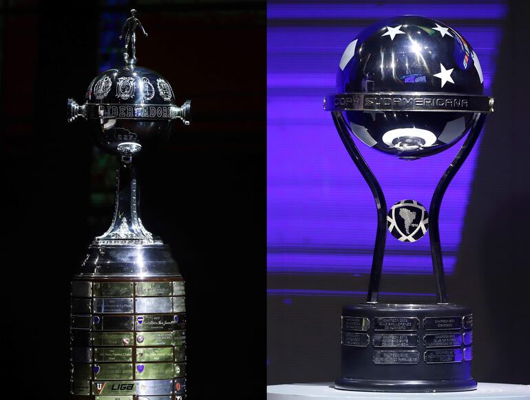 Combo de dos fotógrafías de archivo donde se ven los trofeos de la Copa Libertadores (i) y de la Copa Sudamericana. Ocho clubes brasileños, cuatro argentinos, un boliviano, un colombiano, un ecuatoriano y un paraguayo serán los protagonistas de los cuartos de final de las copas Libertadores y Sudamericana desde el 22 de agosto.