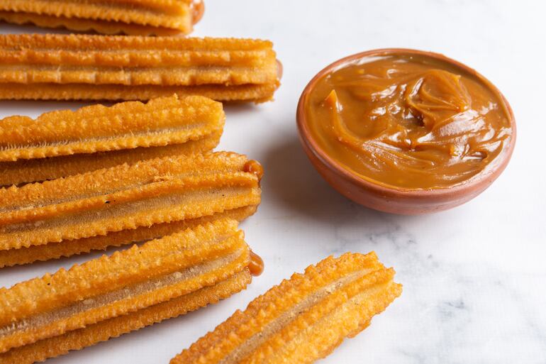 Combinación clásica e infalible: churros con dulce de leche.