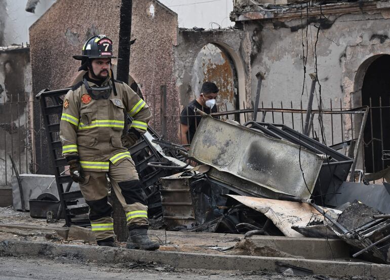 Pese a quedar cercado por el fuego, en medio de la voraz cadena de incendios que a principios de febrero segó la vida de 132 personas en la región de Valparaíso, el barrio de Botania quedó intacto: las llamas no tocaron ninguna de las casas y todos sus habitantes lograron evacuar a tiempo.