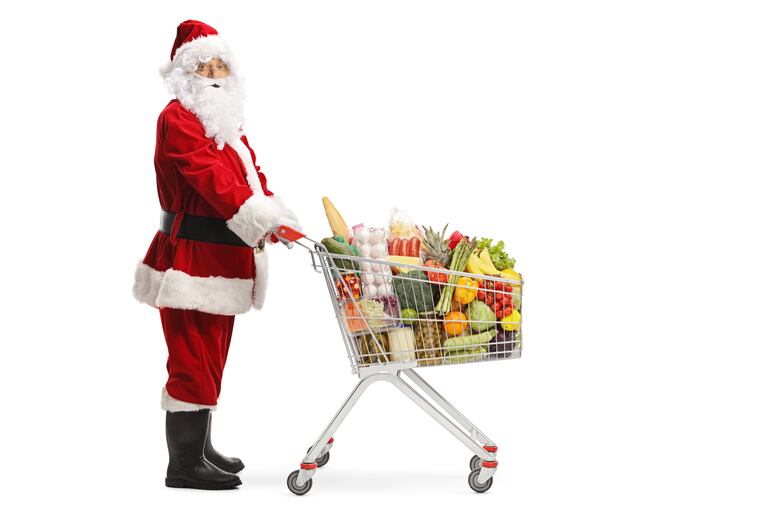 Papá Noel de compras en el supermercado.