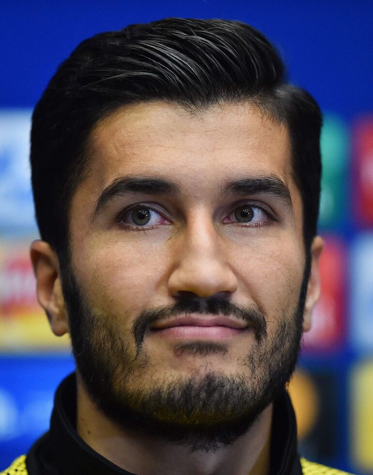 (FILES) Borussia Dortmund's Turkish midfielder Nuri Sahin attends a press conference at Wembley Stadium in London on September 12, 2017, on the eve of their Champions League Group H match against Tottenham Hotspur. Assistant coach Nuri Sahin will become new head coach of BVB Borussia Dortmund, the club announced on June 14, 2024, replacing Edin Terzic. (Photo by GLYN KIRK / AFP) / 