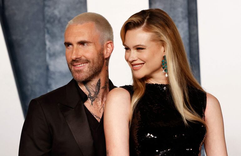 Behati Prinsloo y Adam Levine recibieron a su tercer hijo en 2023. (Michael TRAN/AFP)