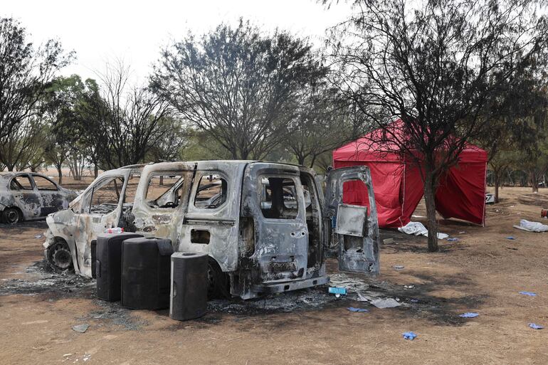 Destrucción y muerte en el festival rave que se realizó cerca de Kibbutz Reim donde atacaron con furia los milicianos de Hamás.  (AFP)