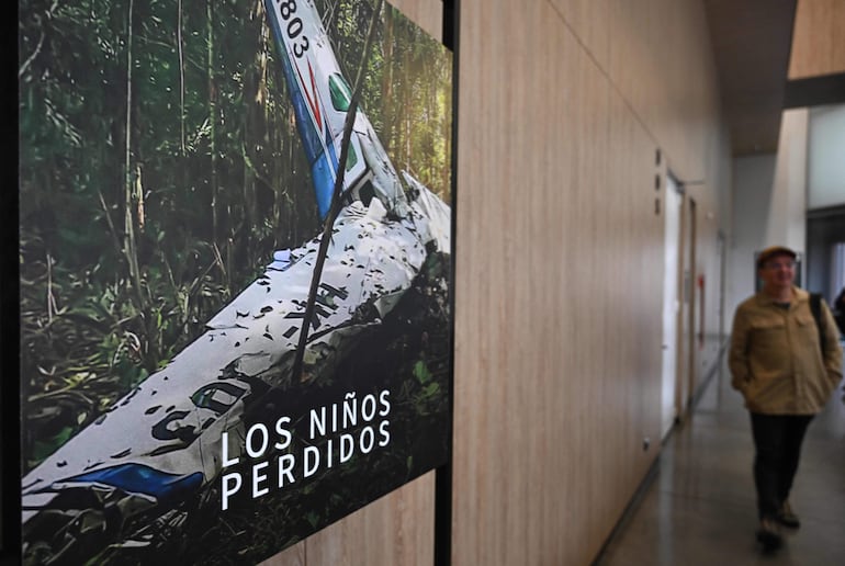 A man attends the presentation of the documentary "Los Niños Perdidos" (The lost children) in Bogota on November 12, 2024. "Los Niños Perdidos' tells the journey of four Indigenous children rescued in the Colombian Amazon jungle in 2023 after surviving 40 days following a plane crash. (Photo by Raul ARBOLEDA / AFP)