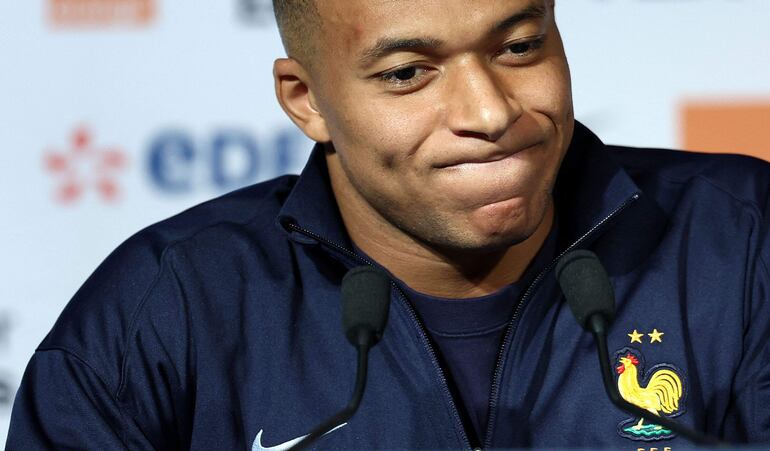 (FILES) France's forward #10 Kylian Mbappe gives a press conference at the Parc des Princes stadium in Paris, on September 5, 2024 on the eve of he UEFA Nations League football match between France and Italy. Captain Kylian Mbappe, who was absent in October, has not been called up to the France squad for the Nations League matches against Israel (November 14) and Italy (November 17), coach Didier Deschamps announced on November 7, 2024. (Photo by FRANCK FIFE / AFP)