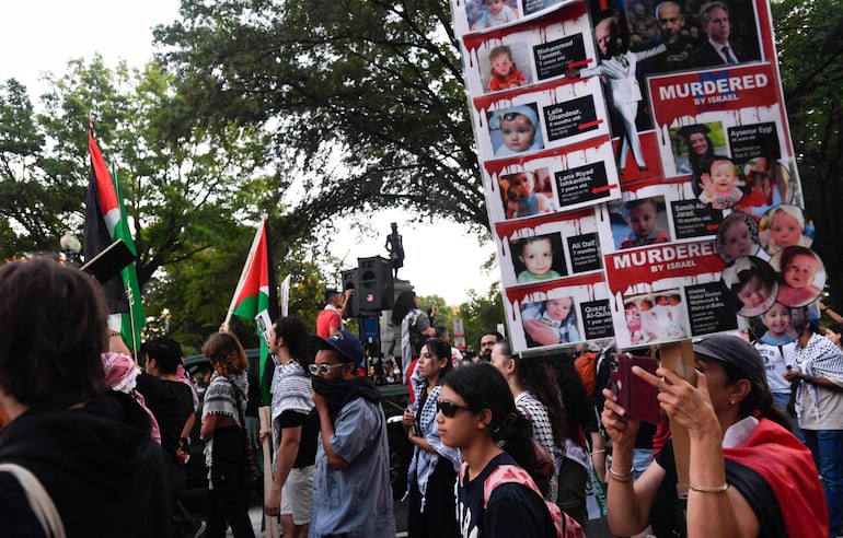 People demonstrate to mark one year of the war between Hamas and Israel near the White House, in Washington, DC on October 5, 2024. (Photo by MATTHEW HATCHER / AFP)