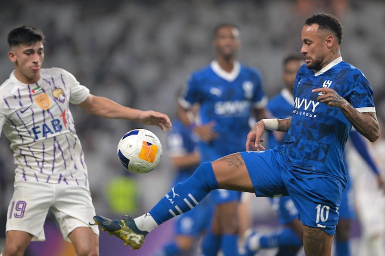 Hilal's Brazilian forward #10 Neymar controls the ball during the AFC Champions League group B football match between UAE's Al-Ain and Saudi's Al-Hilal at the Hazza bin Zayed Stadium in al-Ain on October 21, 2024. (Photo by AFP)