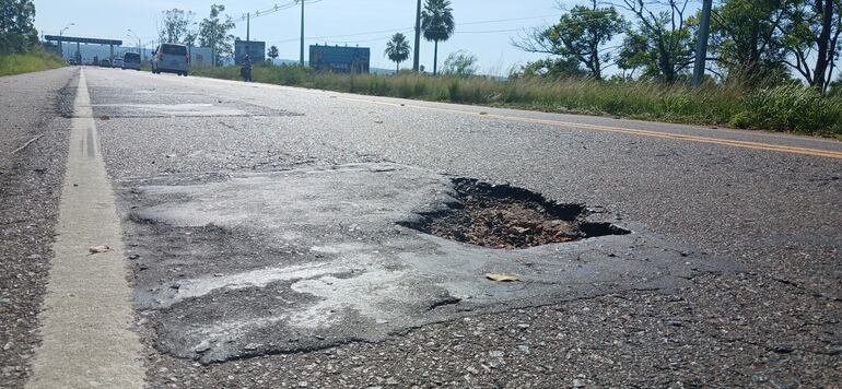 asfalto con baches