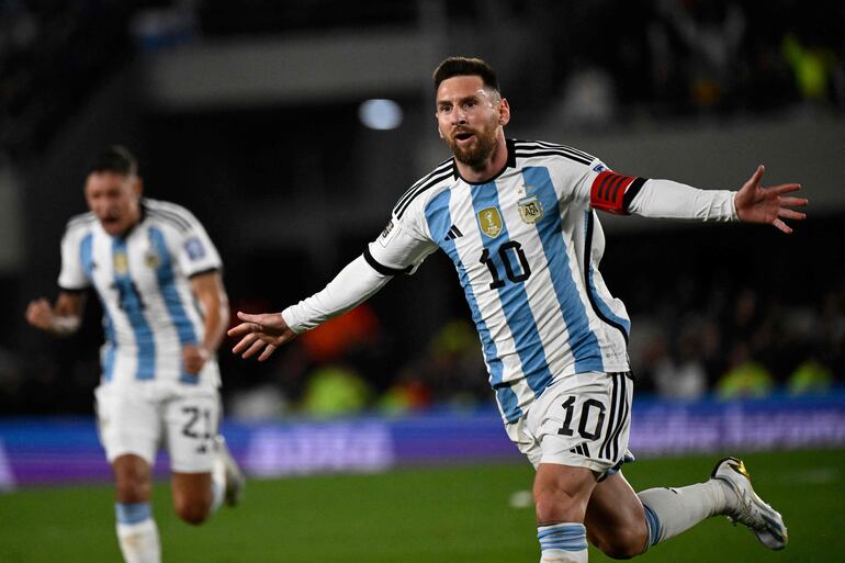 Argentina's forward Lionel Messi celebrates after scoring a goal during the 2026 FIFA World Cup South American qualifiers football match between Argentina and Ecuador, at the Mas Monumental stadium in Buenos Aires, on September 7, 2023. (Photo by Luis ROBAYO / AFP)