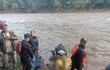 Momento en que el cuerpo era rescatado de las aguas del río Monday, el pasado sábado.
