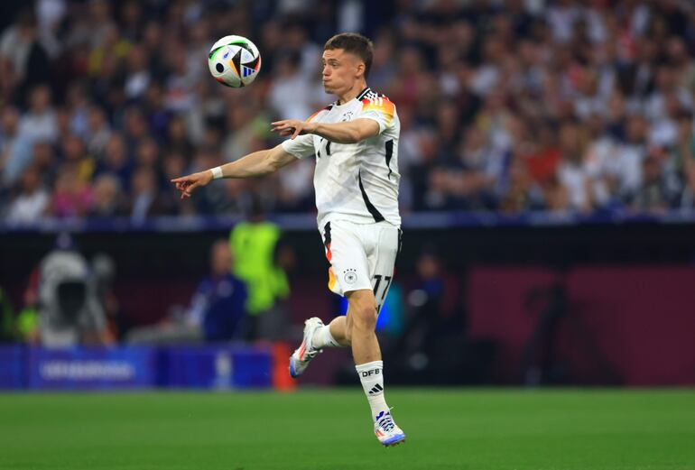 Munich (Germany), 14/06/2024.- Florian Wirtz of Germany in action during the UEFA EURO 2024 group A match between Germany and Scotland in Munich, Germany, 14 June 2024. (Alemania) EFE/EPA/MARTIN DIVISEK
