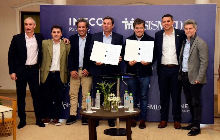 Representantes de Asismed e INECO Argentina.