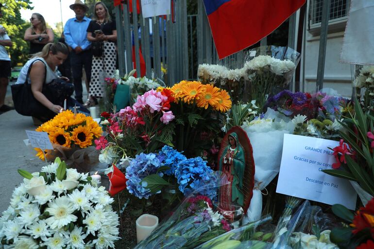 Rinden tributo al expresidente Sebastián Piñera. (AFP)