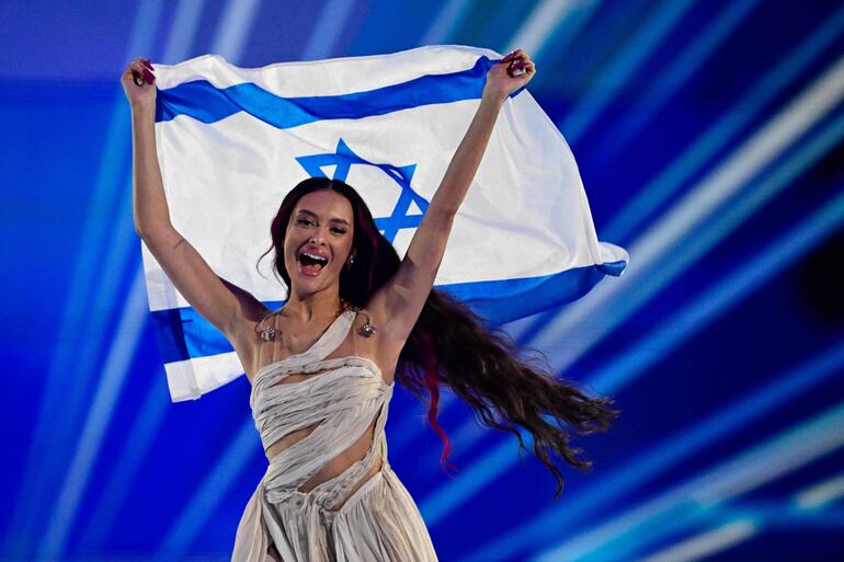 TOPSHOT - Russian-Israeli singer Eden Golan representing Israel with the song "Hurricane" poses at the start of the final of the 68th Eurovision Song Contest (ESC) 2024 on May 11, 2024 at the Malmo Arena in Malmo, Sweden. (Photo by Tobias SCHWARZ / AFP)