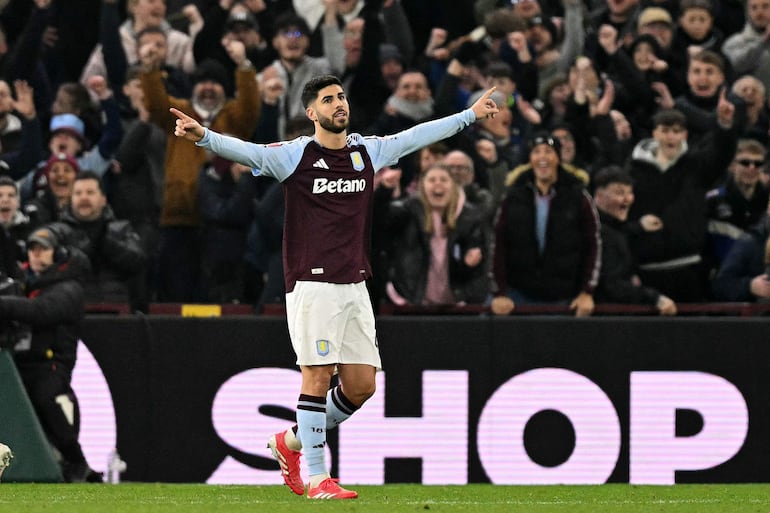 Aston Villa's Spanish midfielder #21 Marco Asensio celebrates scoring the team's second goal during the English FA Cup fifth round football match between Aston Villa and Cardiff City at Villa Park in Birmingham, central England on February 28, 2025. (Photo by Oli SCARFF / AFP) / RESTRICTED TO EDITORIAL USE. No use with unauthorized audio, video, data, fixture lists, club/league logos or 'live' services. Online in-match use limited to 120 images. An additional 40 images may be used in extra time. No video emulation. Social media in-match use limited to 120 images. An additional 40 images may be used in extra time. No use in betting publications, games or single club/league/player publications. / 