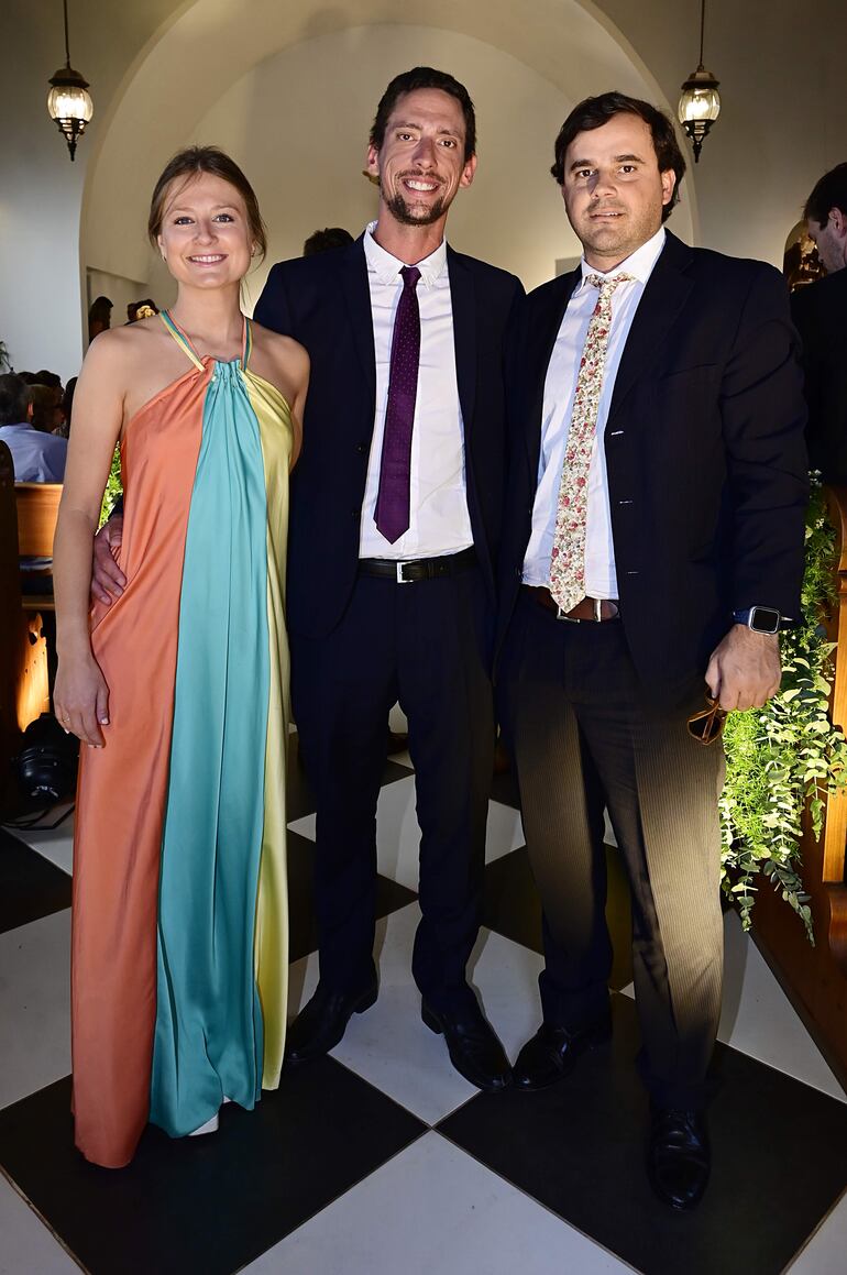 Emilia Boccardo, Daniel Thompson, y Martin Ferrari.