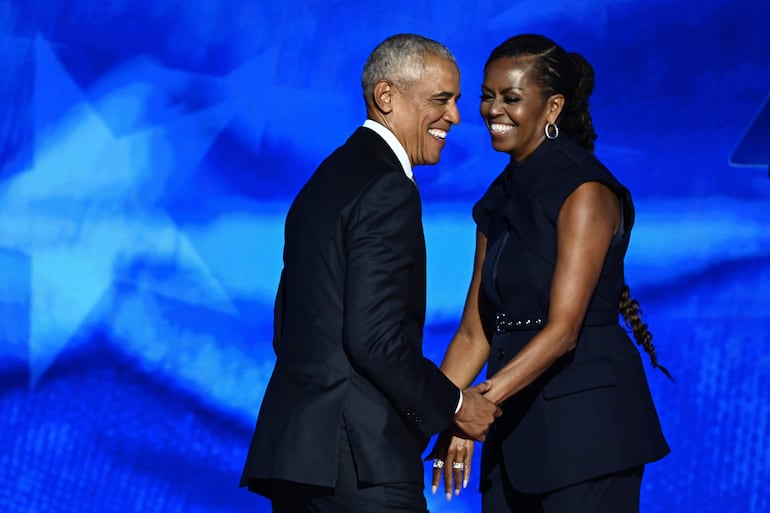 Barack Obama y Michelle Obama llevan más de tres décadas juntos. (Mandel NGAN / AFP)