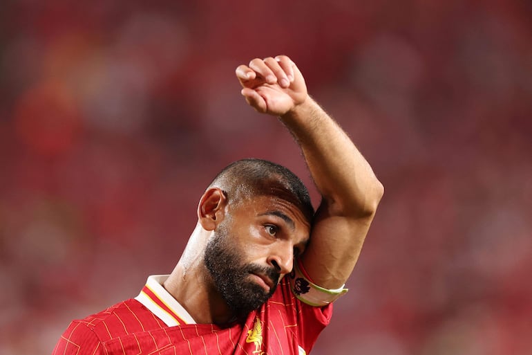 Liverpool's Egyptian striker #11 Mohamed Salah gestures during the pre-season club friendly football match between Arsenal FC and Liverpool FC at Lincoln Financial Field in Philadelphia, Pennsylvania, on July 31, 2024. (Photo by Charly TRIBALLEAU / AFP)