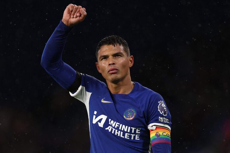 (FILES) Chelsea's Brazilian defender #06 Thiago Silva acknowledges fans at the end of the English Premier League football match between Chelsea and Brighton and Hove Albion at Stamford Bridge in London on December 3, 2023. Brazilian defender Thiago Silva will leave Chelsea at the end of the season after a "dream" four-year spell at Stamford Bridge. Silva announced his farewell on Monday, April 29, in an emotional video message on Chelsea's website. (Photo by Adrian DENNIS / AFP) / RESTRICTED TO EDITORIAL USE. No use with unauthorized audio, video, data, fixture lists, club/league logos or 'live' services. Online in-match use limited to 120 images. An additional 40 images may be used in extra time. No video emulation. Social media in-match use limited to 120 images. An additional 40 images may be used in extra time. No use in betting publications, games or single club/league/player publications. / 