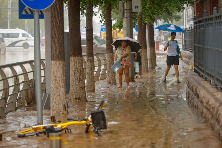 Las lluvias torrenciales en Pekín causan 11 muertos y 27 desaparecidos