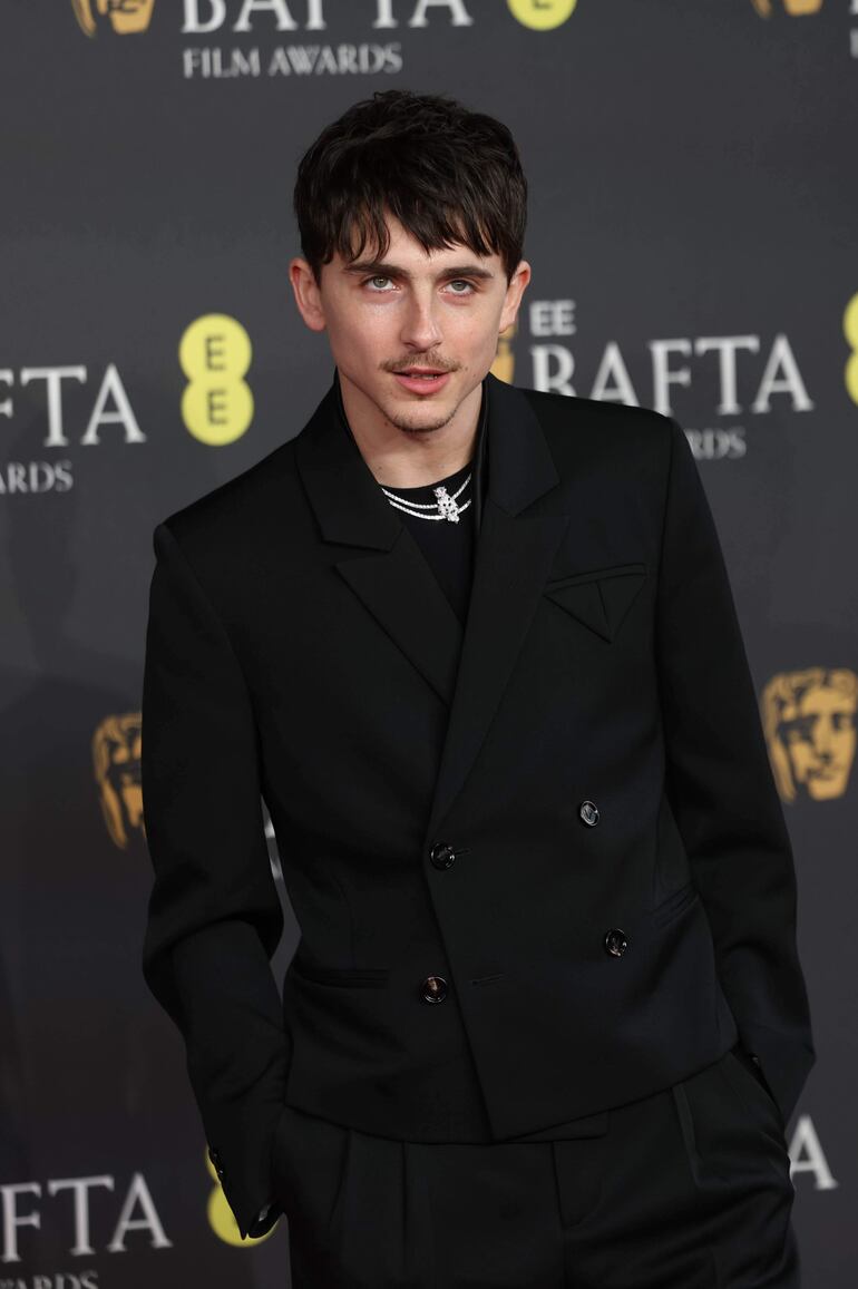 EL actor Timothée Chalamet posando en la red carpet de los BAFTA Film Awards en Londres. (EFE/EPA/ANDY RAIN)
