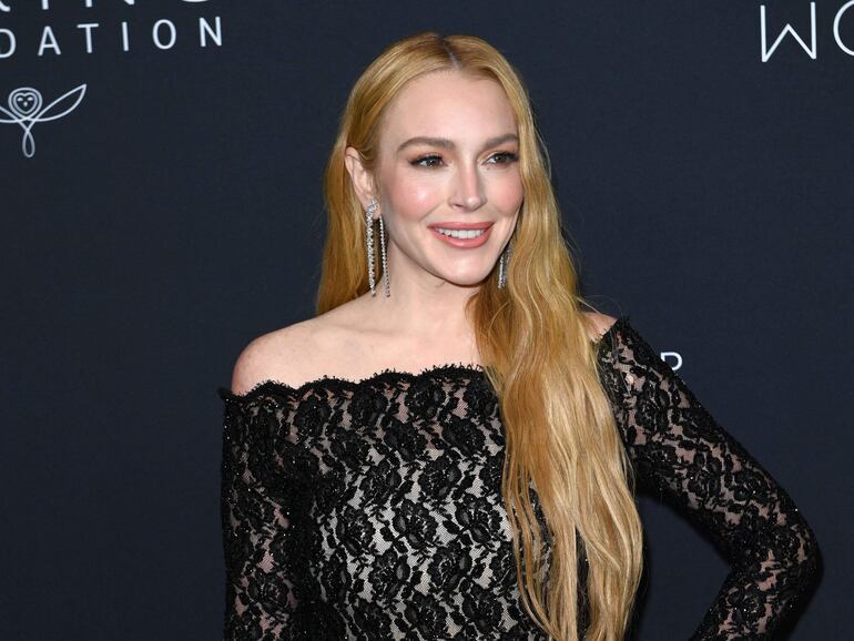 La actriz estadounidense Lindsay Lohan también dijo presente a la cena de gala de la Fundación Kering en The Pool. (Andrea RENAULT / AFP)