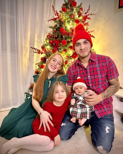 Posado navideño en Nueva York. Flopy Conde y Joseca Báez con sus hijas Dakota y Carlota.