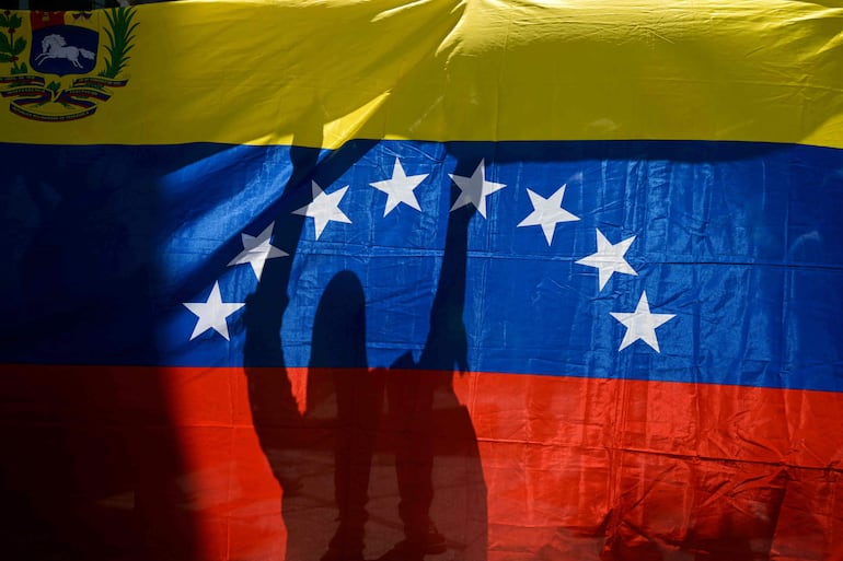 Manifestantes antichavistas protestan el martes en Caracas.
