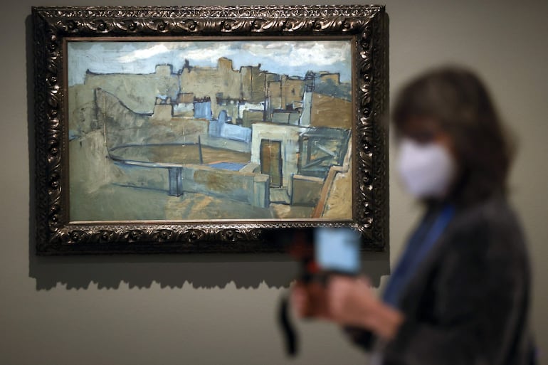 Vista de la obra "Los tejados de Barcelona" (1903), del artista español Pablo Ruiz Picasso. El Museo de San Juan acoge una exposición de unas 40 obras de Pablo Picasso, realizadas entre los años 1899 y 1955, que reflejan múltiples etapas del artista español desde la melancolía de su Periodo Azul hasta sus audaces experimentos con el cubismo y la figura humana.