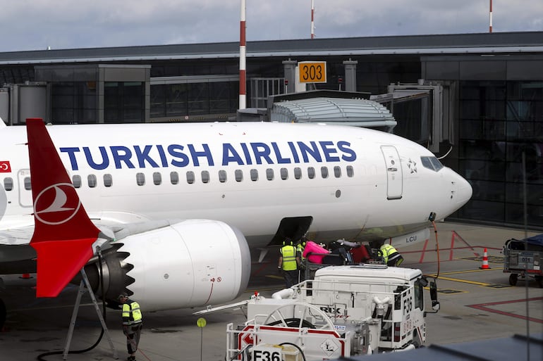 Riga (Latvia), 03/07/2024.- Turkish Airlines Boeing 737 MAX8 is seen at Riga Airport in Riga, Latvia, 03 July 2024. Riga Airport serves as a key Northern European air traffic hub, facilitating connections between the Baltic countries and major European business centers and popular holiday destinations. By joining the Net Zero 2050 initiative, Riga Airport has made a commitment to achieve climate neutrality by 2050. (Letonia) EFE/EPA/TOMS KALNINS
